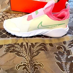Nike flex runner shoes for kids or women who wear a size 5 1/2.